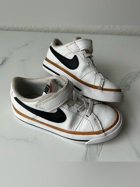 Nike Kids White Sneakers with Black Swoosh and Tan Trim